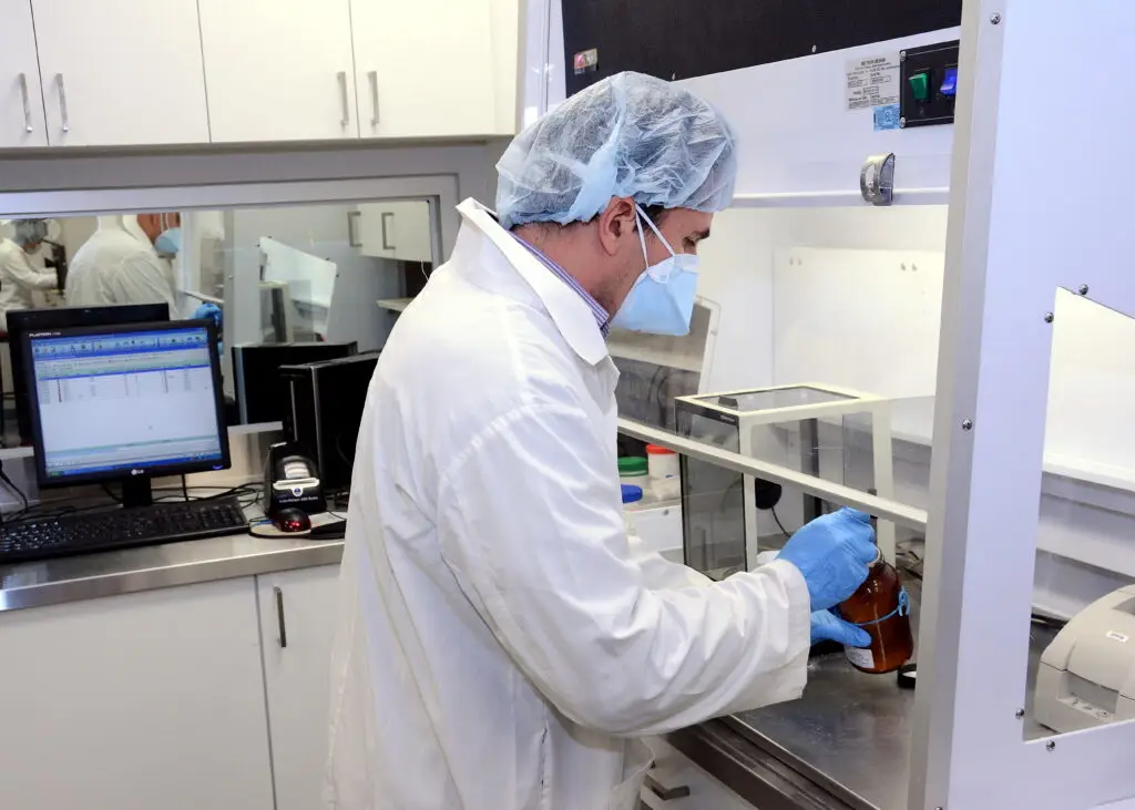 Male Compounder at work